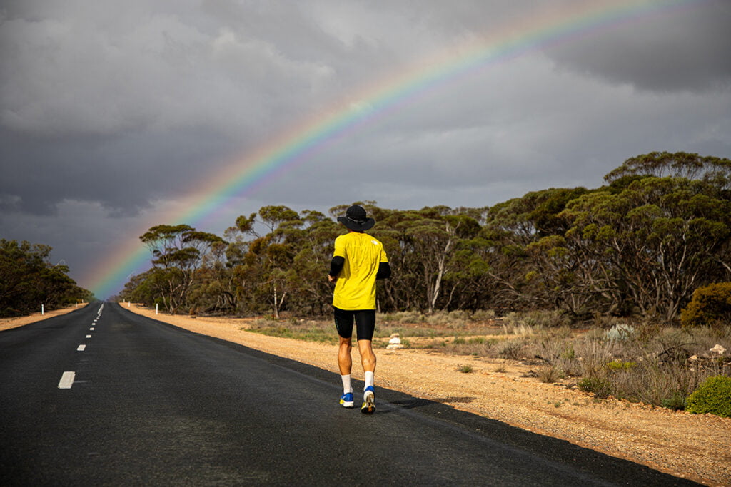 Chris Turnbull running into rainbows